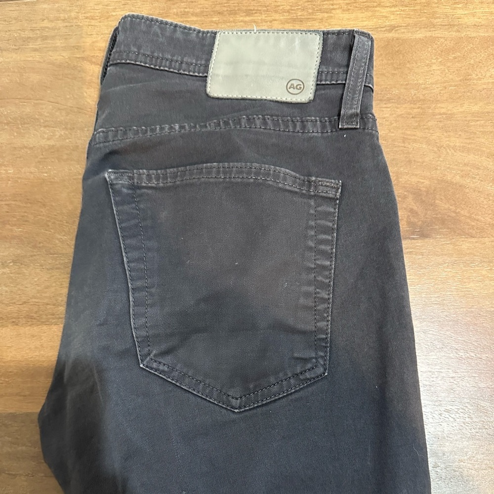 Black or dark grey. Good condition. Slim fitting. Timeless & quality.